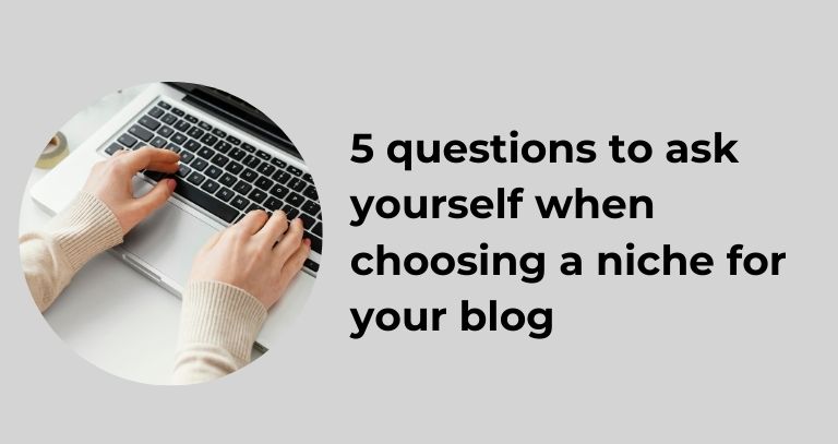grey image with user typing on a black and  grey laptop heading titles 5 questions to ask yourself whe choosing a niche for your blog